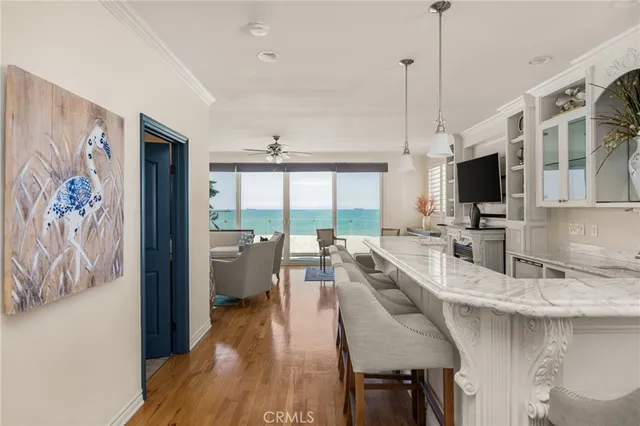 a bedroom with bed tv and furniture