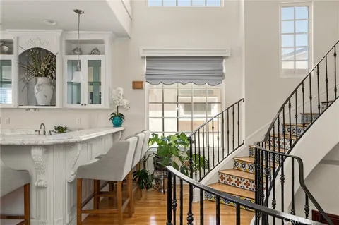 a spacious bathroom with a granite countertop sink and a mirror