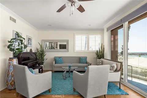 an aerial view of a house with a lake view