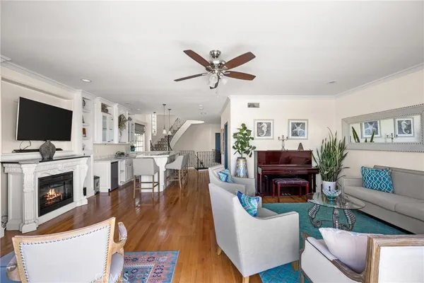 an aerial view of a ocean with beach