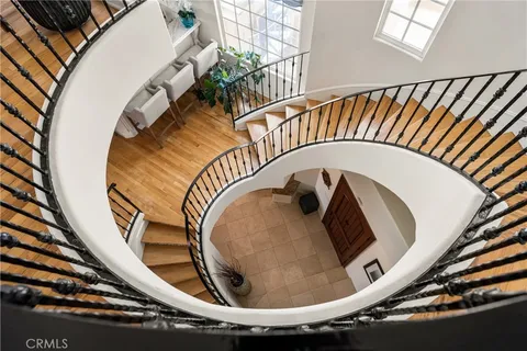 an aerial view of a house with a lake view