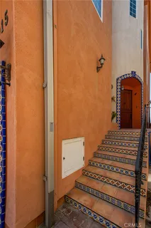 a kitchen with stainless steel appliances granite countertop a stove and a refrigerator