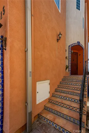 a kitchen with stainless steel appliances granite countertop a stove and a refrigerator
