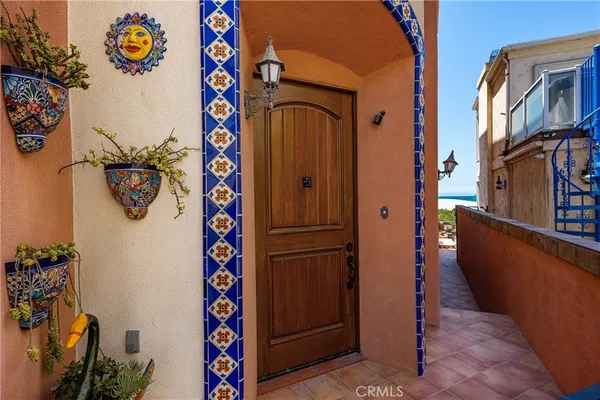 a living room with fireplace furniture and a flat screen tv