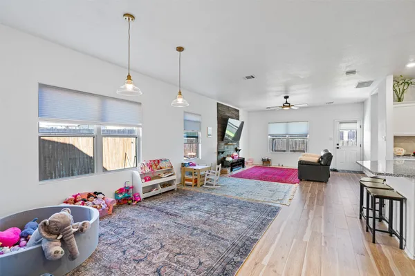 a bedroom with furniture or couch and a window