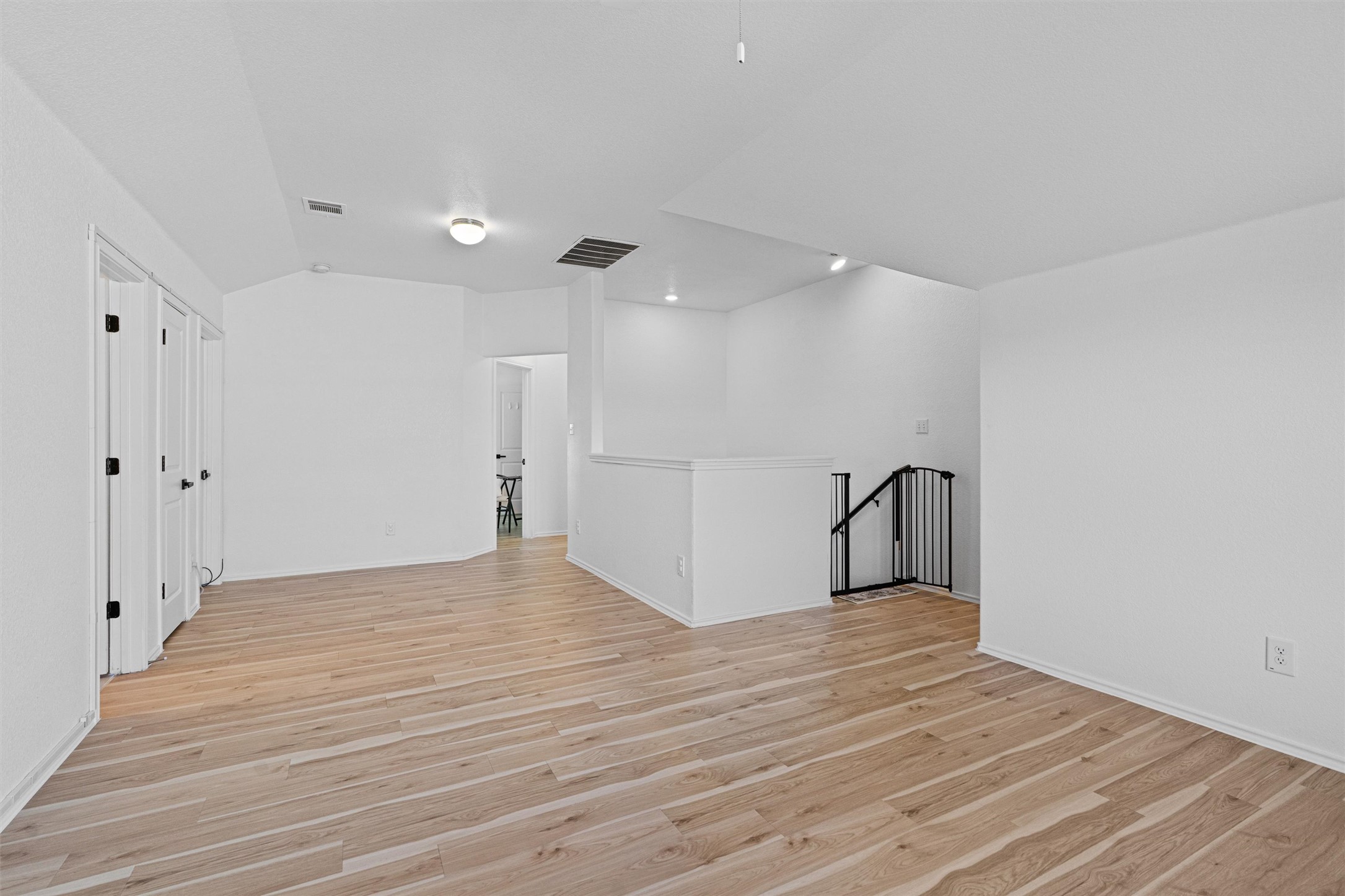 327 Andesite Trail Buda, TX 78610 - Photo 24 of 40 a view of empty room with wooden floor