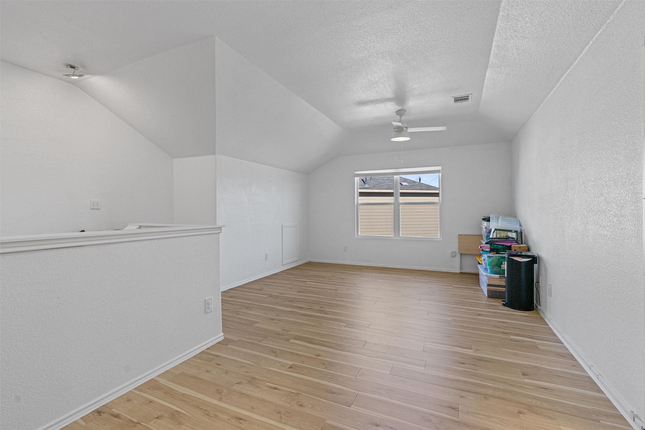 327 Andesite Trail Buda, TX 78610 - Photo 25 of 40 wooden floor in an empty room
