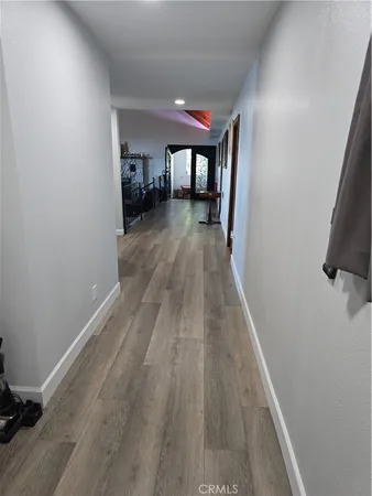 a bedroom with bed and window