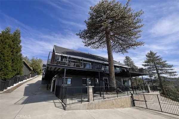 a view of a chairs and tables in the patio