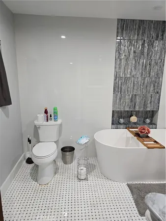 a view of a swimming pool with a yard