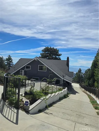 a kitchen with sink stove and cabinets