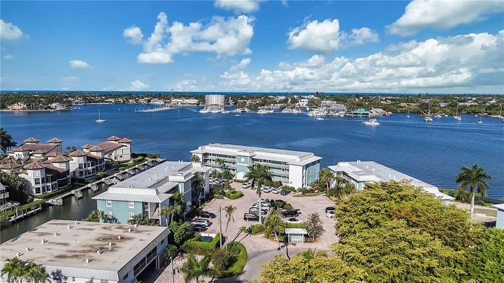 1200 Blue Point Avenue, Unit A2 Naples, FL 34102 - Photo 25 of 30 The property is situated along a waterfront with direct access to a body of water featuring numerous boats