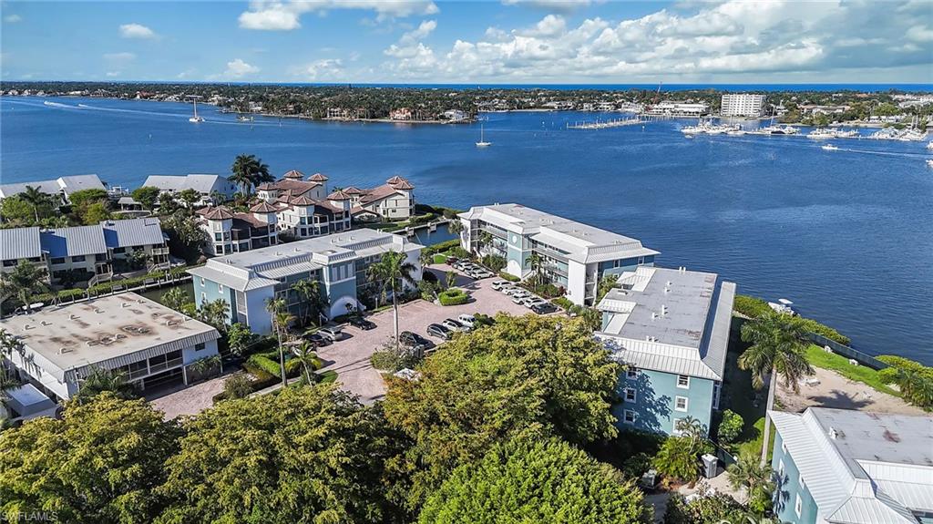 1200 Blue Point Avenue, Unit A2 Naples, FL 34102 - Photo 26 of 30 This property offers expansive water views and is situated in a vibrant waterfront community with nearby marinas