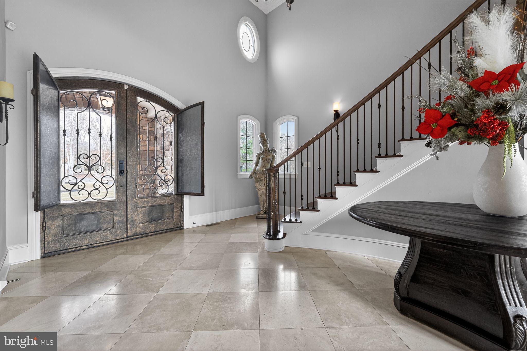 31 Barry Road Lambertville, NJ 08530 - Photo 7 of 52 2 story foyer with curved staircase