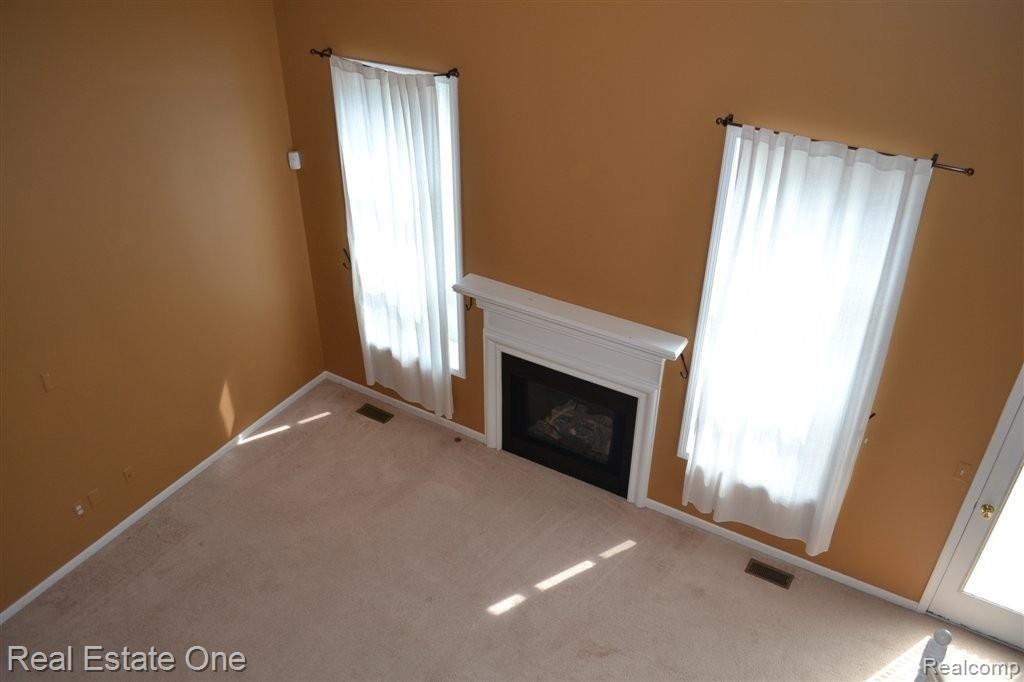 45586 Rathmore Drive, Unit 276 Macomb, MI 48044 - Photo 9 of 25 2-Story Great Room