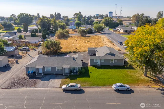 a view of a house with outdoor space and swimming pool