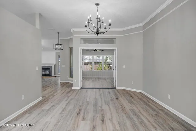 a view of an empty room and window