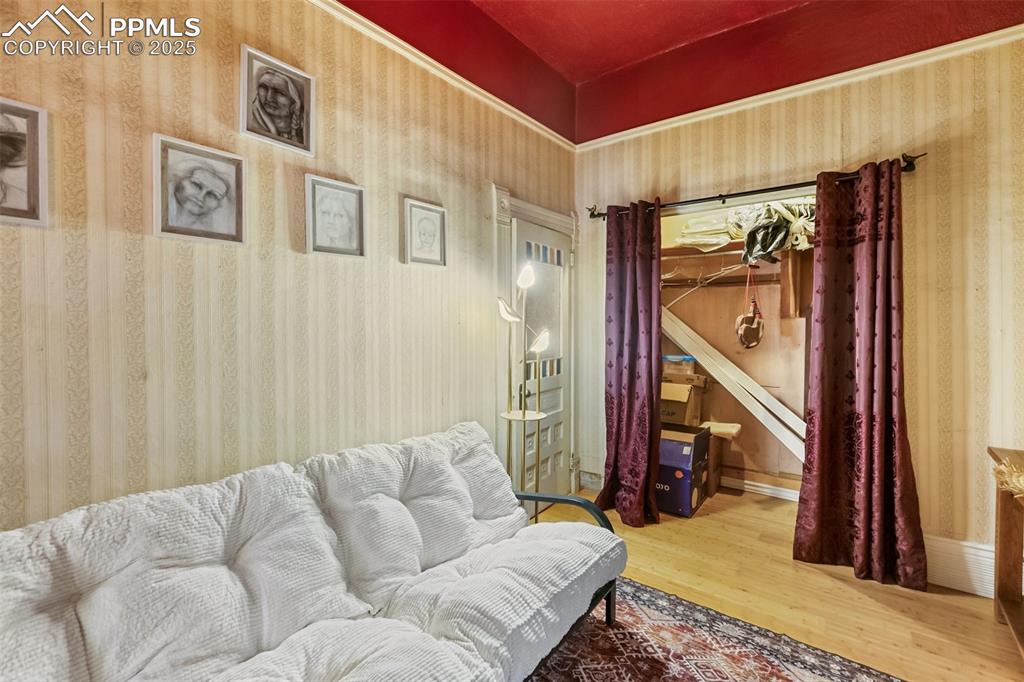 119 South 3rd Street Victor, CO 80860 - Photo 33 of 38 a living room with furniture and a fireplace