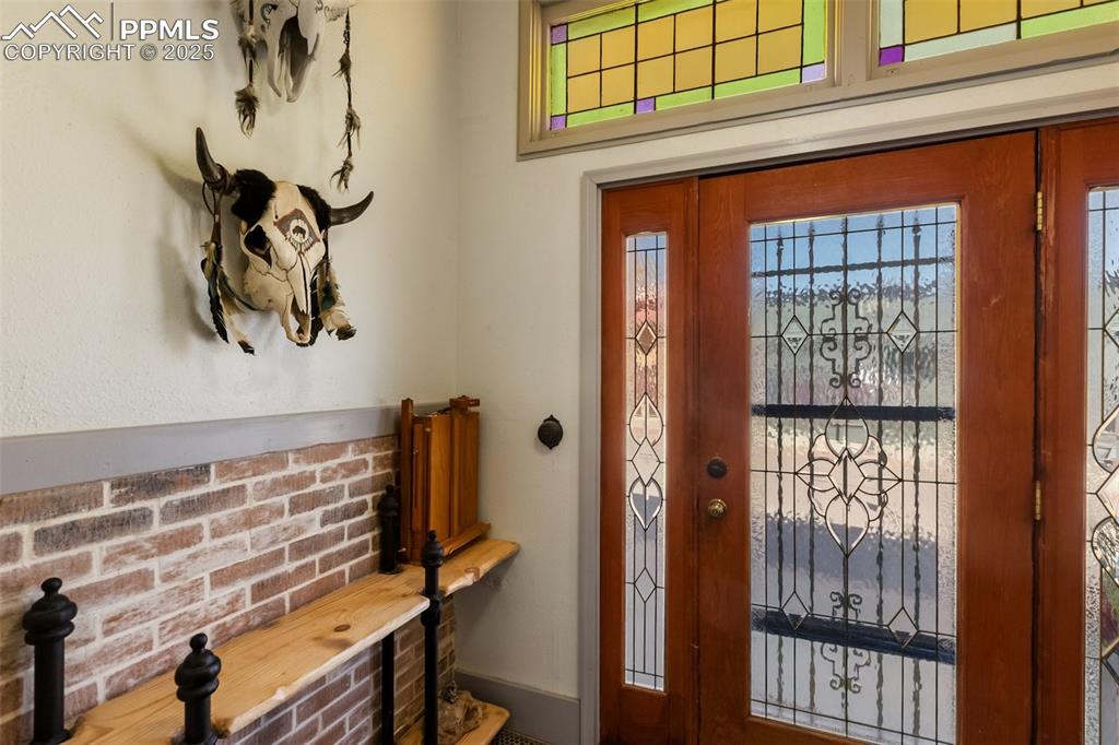 119 South 3rd Street Victor, CO 80860 - Photo 6 of 38 a front view of a house with wooden stairs