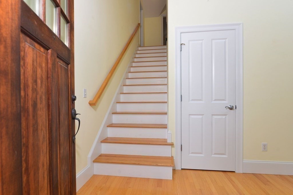 15 Hathaway Pond Circle, Unit 15 Rochester, MA 02770 - Photo 18 of 36 a view of an entryway with staircase