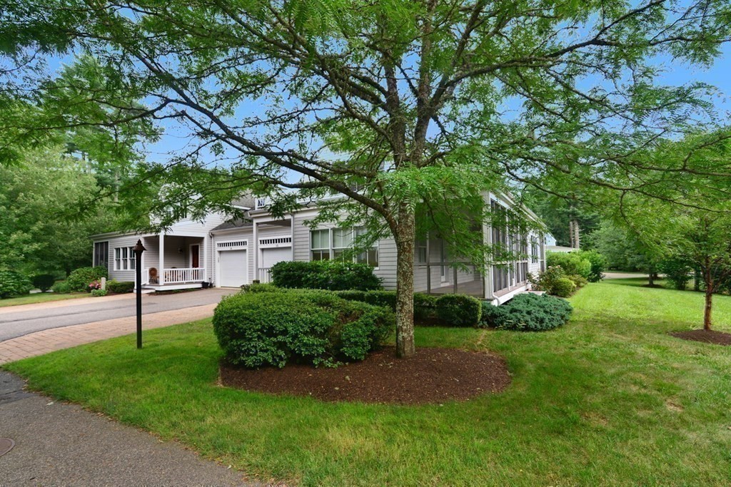 15 Hathaway Pond Circle, Unit 15 Rochester, MA 02770 - Photo 30 of 36 a front view of a house with garden