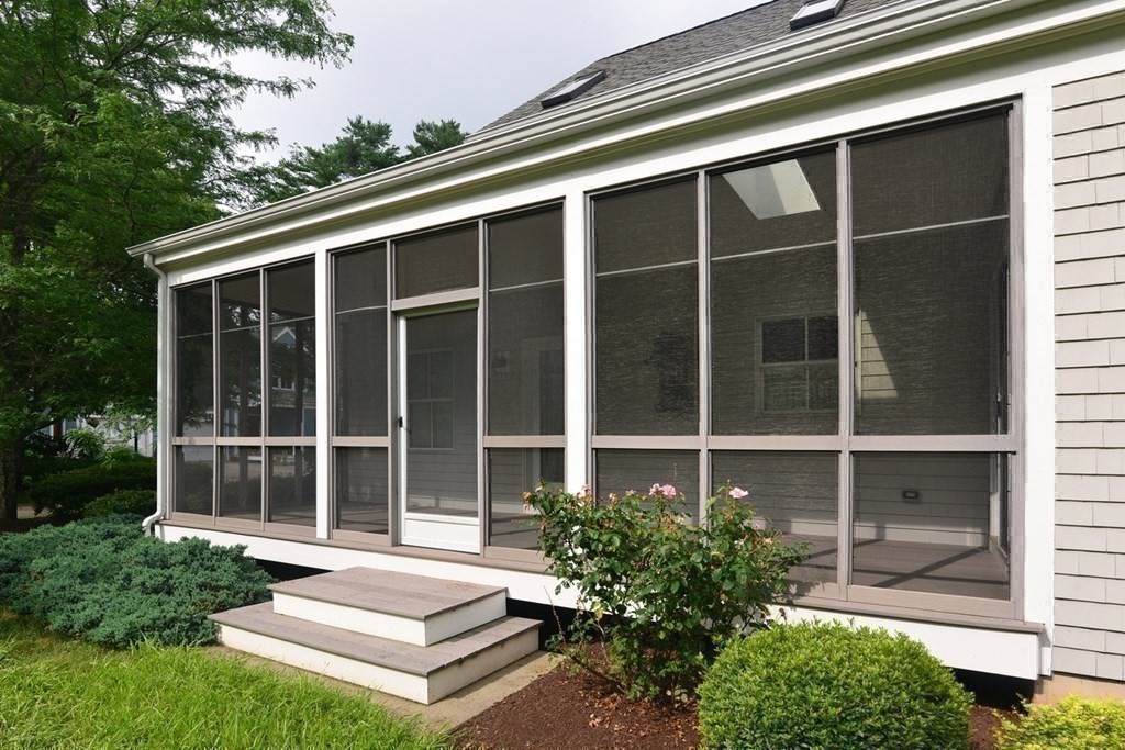 15 Hathaway Pond Circle, Unit 15 Rochester, MA 02770 - Photo 31 of 36 a house with trees in front of it