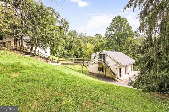 a house view with a outdoor space