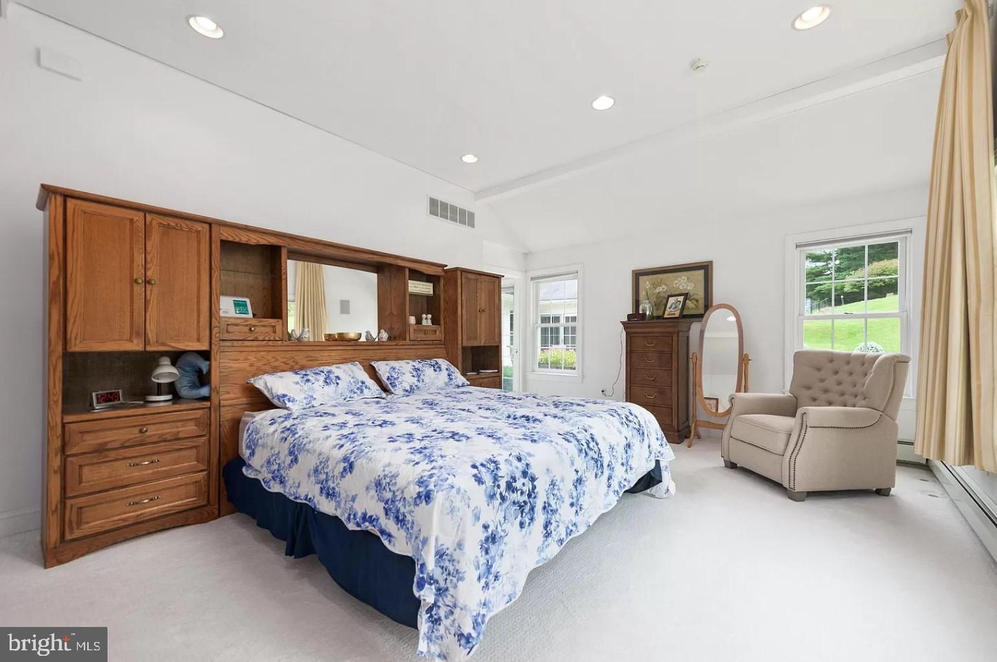 908 Lincoln Road Phoenixville, PA 19460 - Photo 14 of 26 a bedroom with a large bed and a couch