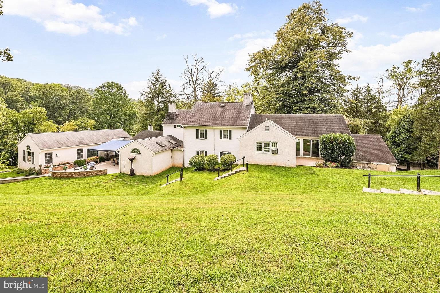 908 Lincoln Road Phoenixville, PA 19460 - Photo 2 of 26 a view of a house with pool and a yard