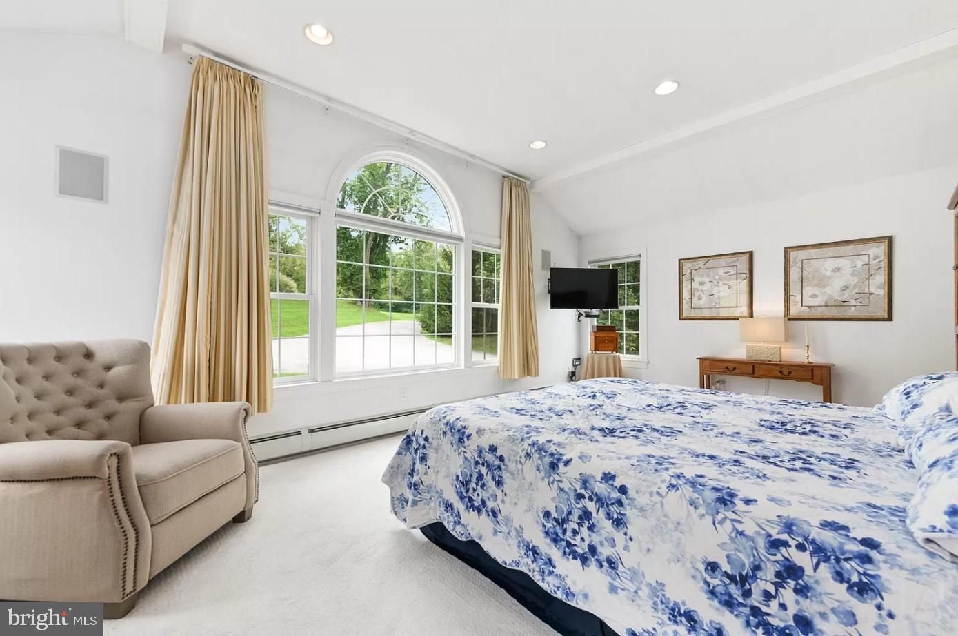 908 Lincoln Road Phoenixville, PA 19460 - Photo 21 of 26 a bedroom with a large bed and a couch