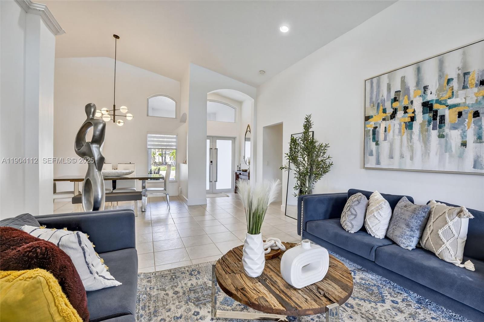 18950 Southwest 16th Street, Unit 1950 Pembroke Pines, FL 33029 - Photo 14 of 51 a living room with furniture and wooden floor