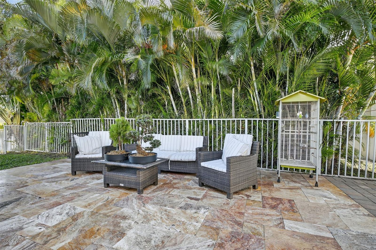 18950 Southwest 16th Street, Unit 1950 Pembroke Pines, FL 33029 - Photo 48 of 51 a garden view with a seating space