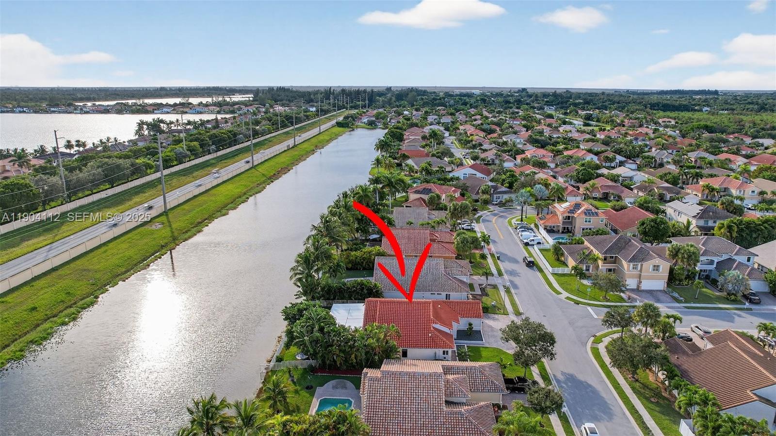 18950 Southwest 16th Street, Unit 1950 Pembroke Pines, FL 33029 - Photo 5 of 51 an aerial view of a city