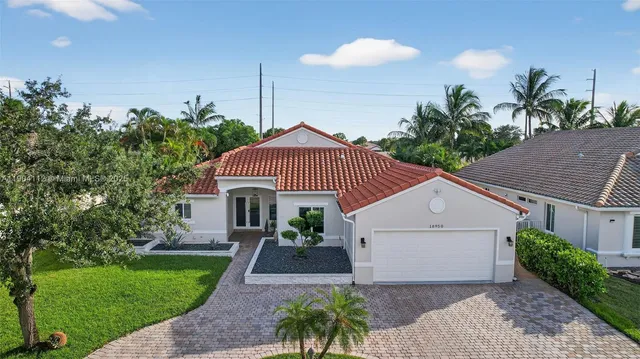 a view of a livingroom with furniture and a chandelier