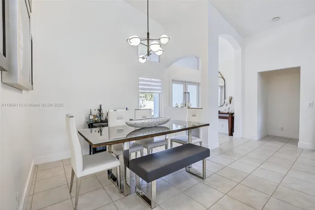 a view of a living room and dining room