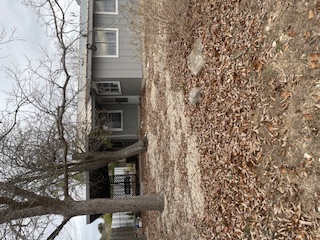 1516 South Ranchero Road South Kerrville, TX 78028 - Photo 9 of 16 a front view of a house with a garden