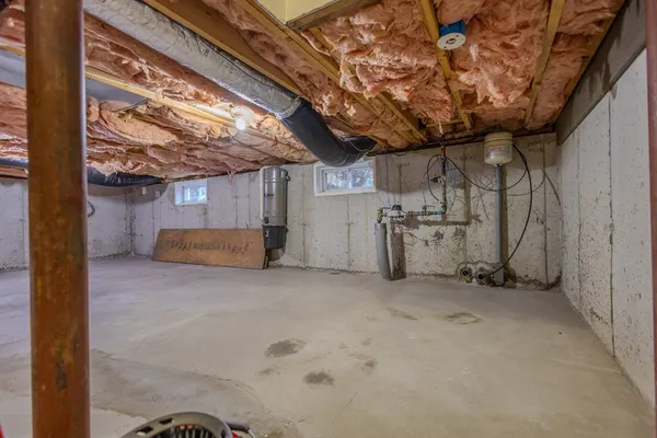 a view of a room with wooden walls