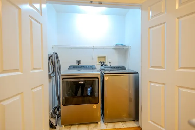 a utility room with washer and dryer