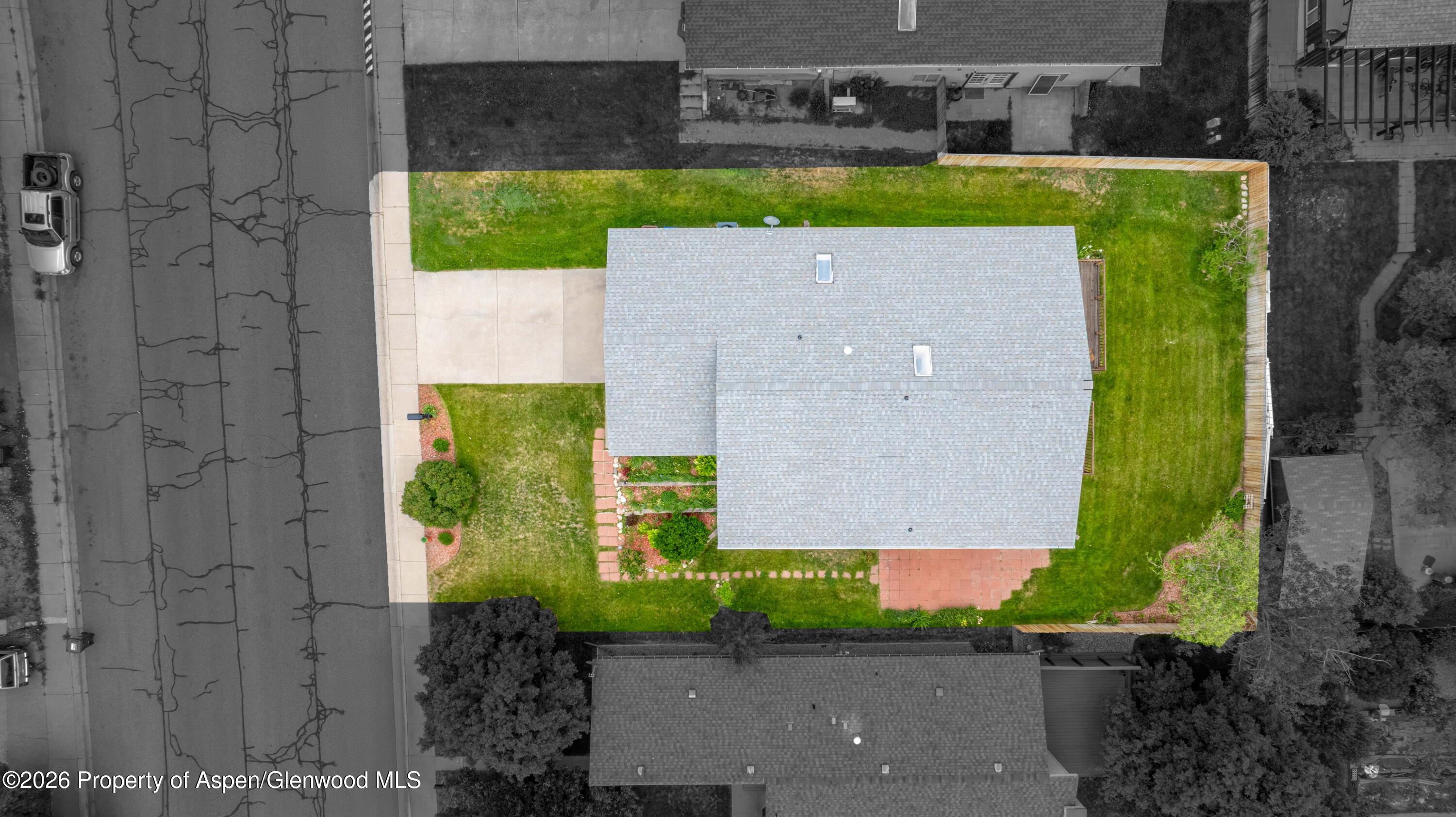 660 Aspen Avenue Rifle, CO 81650 - Photo 29 of 30 an aerial view of a house with a yard basket ball court and outdoor seating