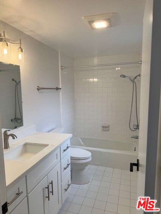 13322 Maxella Avenue, Unit 2 Marina del Rey, CA 90292 - Photo 13 of 20 a bathroom with a sink a toilet and shower