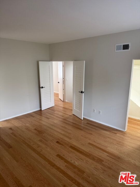 13322 Maxella Avenue, Unit 2 Marina del Rey, CA 90292 - Photo 19 of 20 a view of an empty room and wooden floor