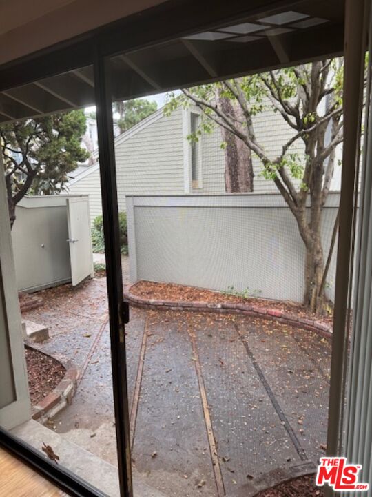 13322 Maxella Avenue, Unit 2 Marina del Rey, CA 90292 - Photo 9 of 20 a backyard of a house with wooden floor