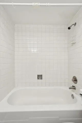 a bathroom with a bathtub