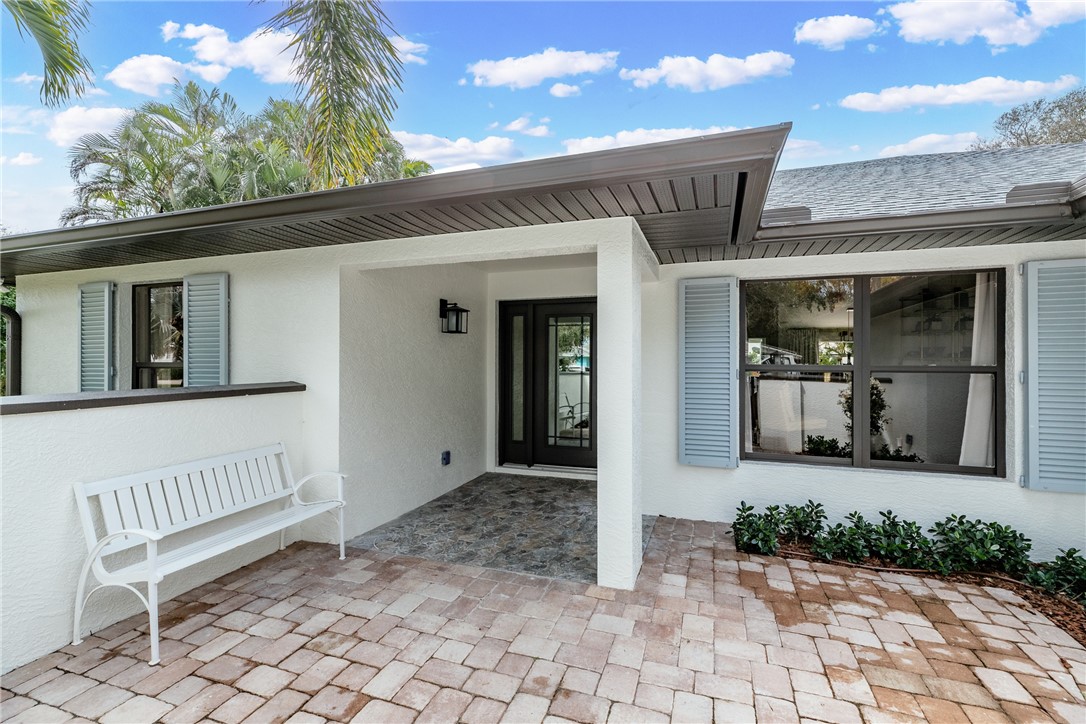700 Holly Road Vero Beach, FL 32963 - Photo 35 of 36 a view of a house with a porch