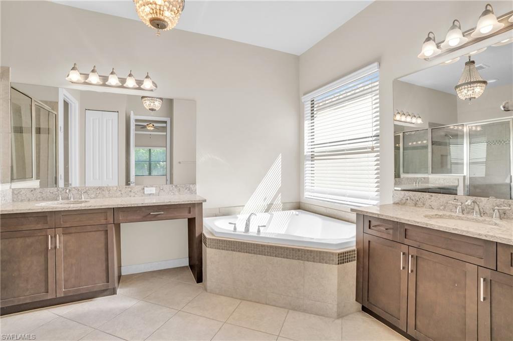4420 Aurora Street Naples, FL 34119 - Photo 10 of 50 Primary Bathroom Soaking Tub