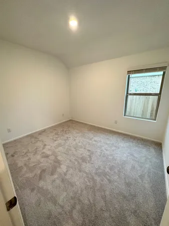 an empty room with a workbench