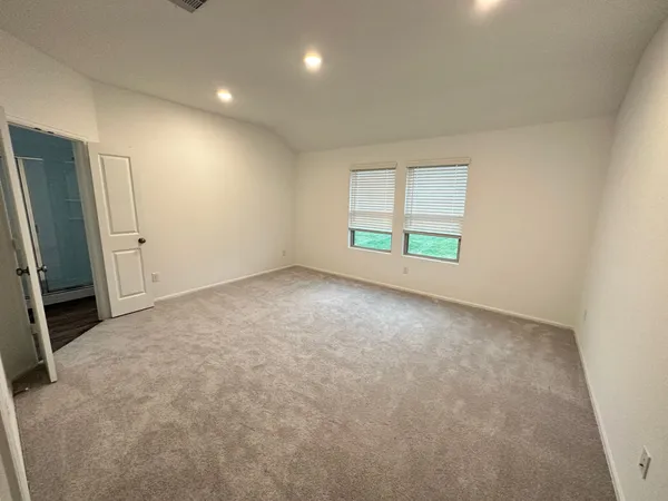 an empty room with windows