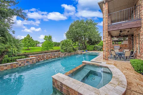 $900,000 | 83 Wyndehaven Lakes Drive, Katy, TX 77494