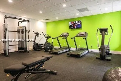 a view of a room with gym equipment