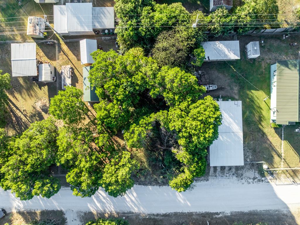 Tbd Cedar Drive Whitney, TX 76692 - Photo 4 of 13 an aerial view of a house with a yard and garden